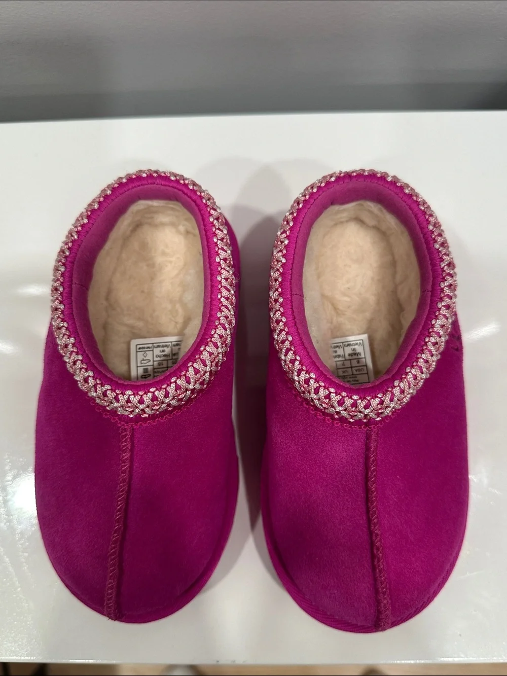 UGG Kids Slip-On Slippers in Fuchsia with Embroidered Trim